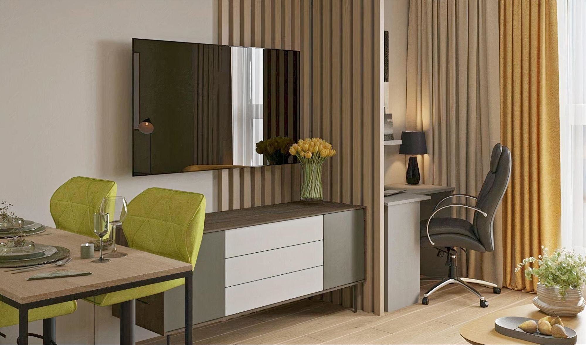 В кухне-гостиной достаточно места, чтобы организовать и рабочую зону
